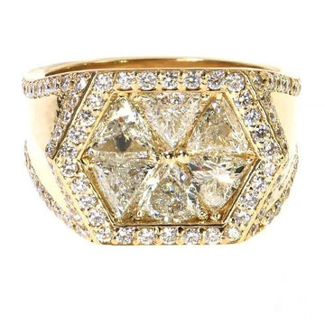 Yellow gold ring with hexagon trillion cut diamonds and diamond accents on band.