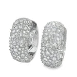 Silver hoop earrings with inverted mosaic pattern of clustered sparkling diamonds.