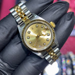Rolex DateJust 26mm | Two Tone Yellow Gold | Champagne Diamond Dial | 69173