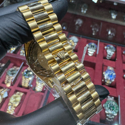 Rolex Day-Date 36mm Champagne Stick Dial Roman Chapter Ring Fluted Bezel 18K Yellow Gold | Pre-Owned 71207