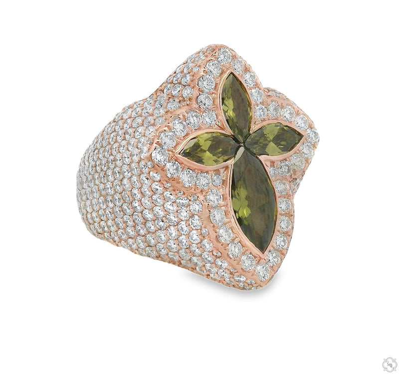 Rose gold ring with cross-shaped green quartz and surrounding diamonds