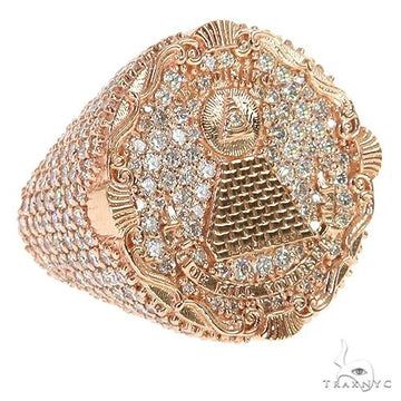 Rose gold men's ring with pyramid design and encrusted diamonds.