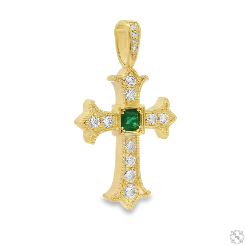 Yellow gold cross pendant with central emerald and surrounding diamonds, intricate design