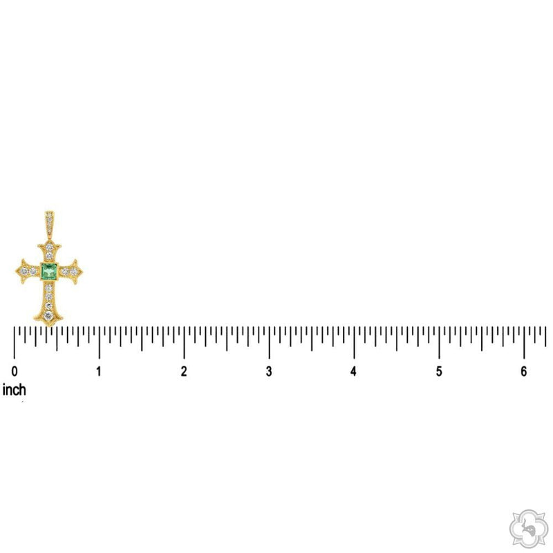 Yellow gold cross pendant with central emerald and surrounding round diamonds