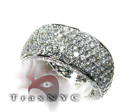 Wide white gold men's ring paved with multiple sparkling diamonds