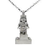 Silver TraxNYC Jesus pendant with blue diamond eyes on anchor cable chain.