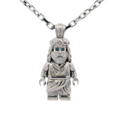 Silver TraxNYC Jesus pendant with blue diamond eyes on anchor cable chain.