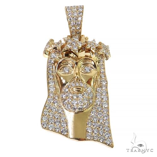 Diamond Jesus pendant with crown of stars – front-facing portrait with halo detail in white and yellow metal