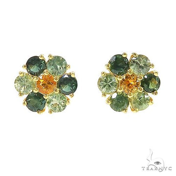Yellow sapphire cluster flower stud earrings in gold setting.