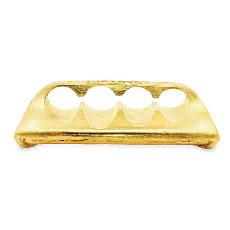 24k gold four-finger ring styled as a gold bullion bar with detailed engravings.