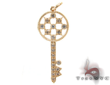 Diamond key pendant in 14k yellow gold – front view showing diamond-set key silhouette