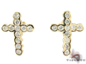Yellow gold cross earrings adorned with round sparkling diamonds.
