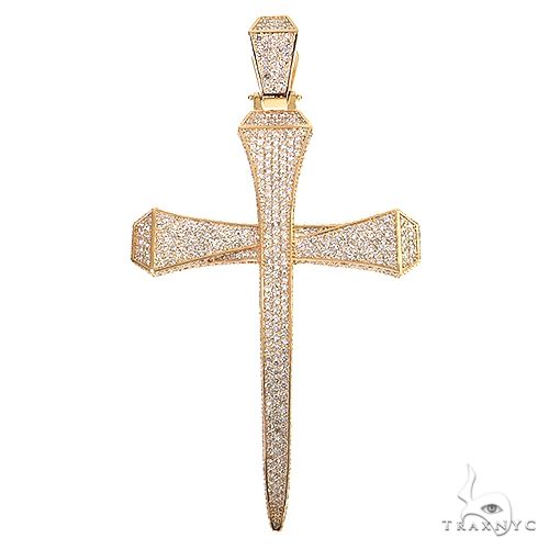 Large yellow gold cross pendant encrusted with small diamonds and textured edges