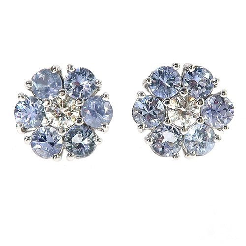 Large white gold flower earrings with sapphire petals and diamond center cluster