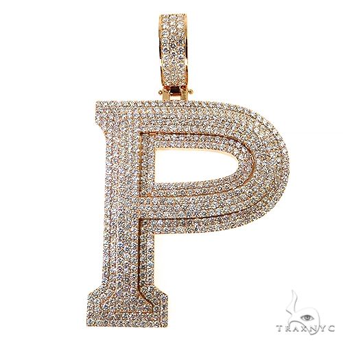 Large yellow gold initial pendant "P" encrusted with multiple diamonds, bold design