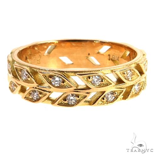 Yellow gold leaf-patterned eternity ring with embedded diamonds, size 6