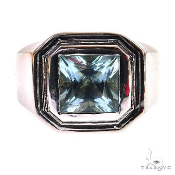 Yellow gold men's ring with square aquamarine and black enamel accents.