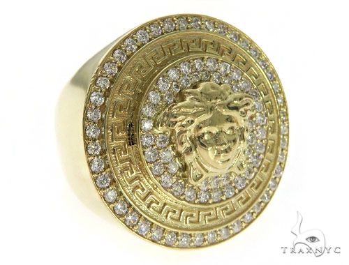 Men's diamond ring in gold with Medusa-inspired face design set with round diamonds, front-angle view