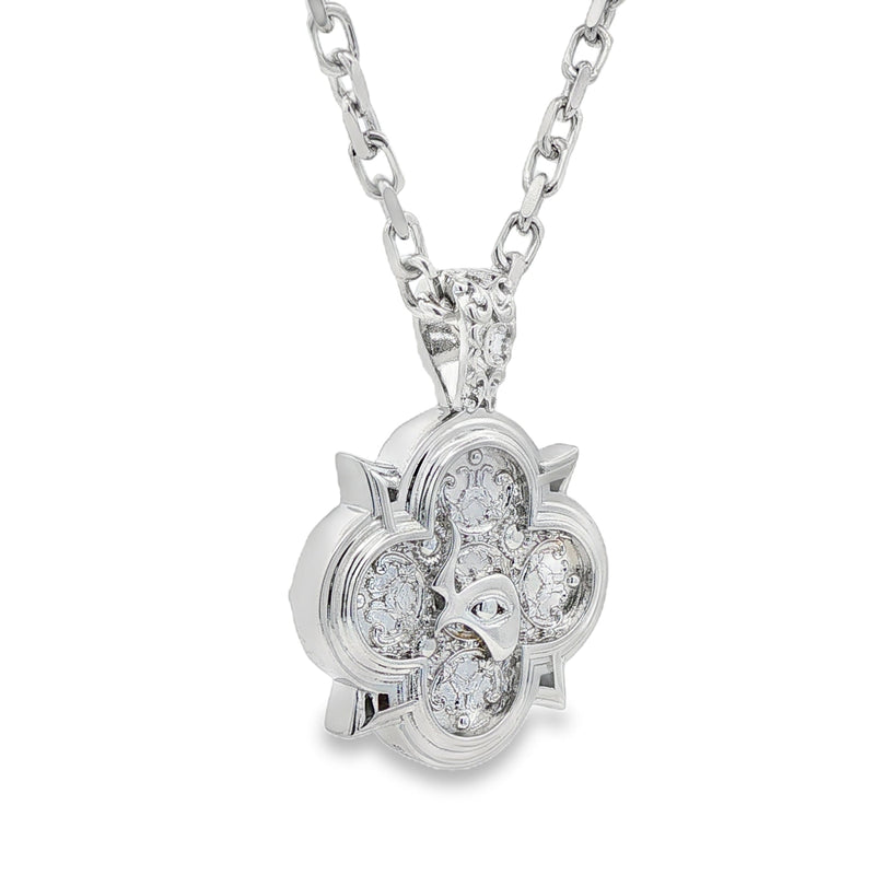 Silver pendant with sparkling round stones in a floral-inspired design on silver chain.