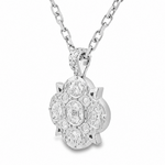 Silver pendant with round hammered circle design on silver chain necklace.