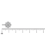 Silver pendant with floral diamond cluster and rope chain on white background with ruler.