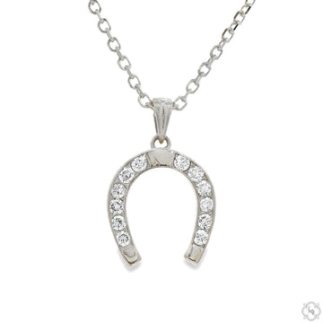 Silver horseshoe pendant with diamonds on a delicate chain, .925 sterling silver finish.