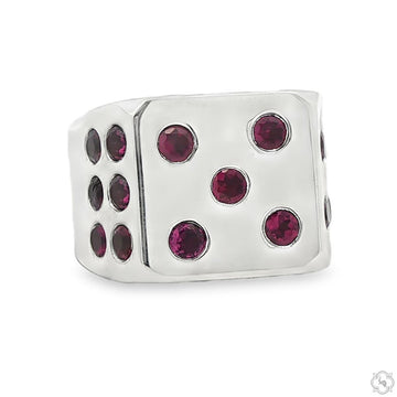 Silver men's ring shaped like a dice with red ruby gemstone dots on all sides.