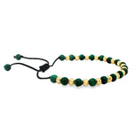 Adjustable bracelet with alternating green malachite and textured gold round beads on black cord.