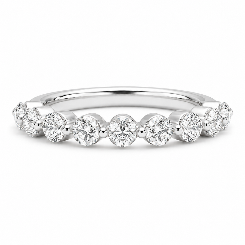 14K gold bubble diamond wedding band with 0.65 carat total weight of round lab grown diamonds in a single-prong half-eternity setting.