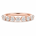 14K gold bubble diamond wedding band with 0.65 carat total weight of round lab grown diamonds in a single-prong half-eternity setting.