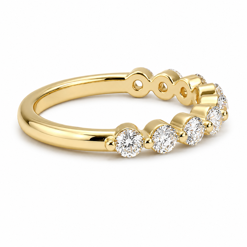 14K gold bubble diamond wedding band with 0.65 carat total weight of round lab grown diamonds in a single-prong half-eternity setting.