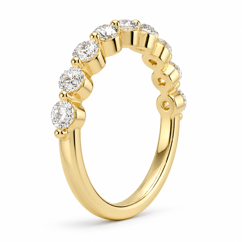 14K gold bubble diamond wedding band with 0.65 carat total weight of round lab grown diamonds in a single-prong half-eternity setting.
