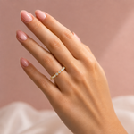 14K gold bubble diamond wedding band with 0.65 carat total weight of round lab grown diamonds in a single-prong half-eternity setting.