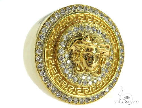 Heavy mens diamond ring in gold with round-cut stones in prong setting — front profile view