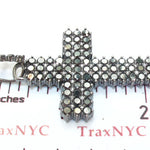Black diamond chain necklace with a matching cross pendant in a dark metallic finish.