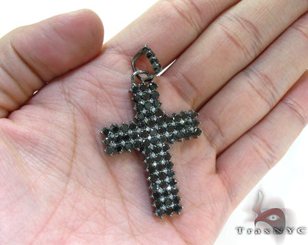 Black diamond chain necklace with a matching cross pendant in a dark metallic finish.