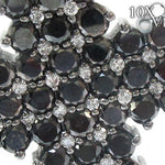 Black diamond chain necklace with a matching cross pendant in a dark metallic finish.