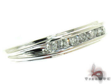 Men's white gold channel diamond wedding band with seven flush-set round diamonds