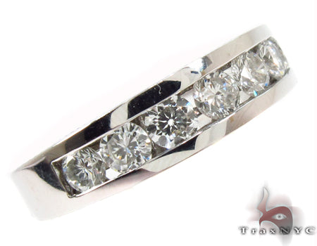 Yellow gold men's wedding band with channel-set round diamonds