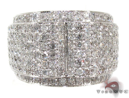 Men's white gold pinky ring with multiple rows of small sparkling diamonds