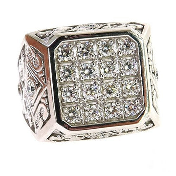Men's yellow gold square ring with multiple channel-set diamonds and intricate side engravings.