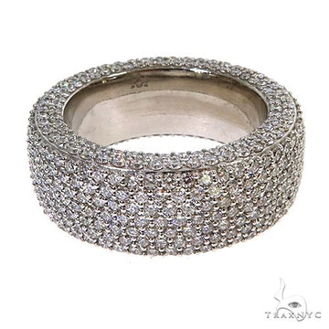 Wide men's diamond wedding band in white gold with multiple rows of small diamonds.