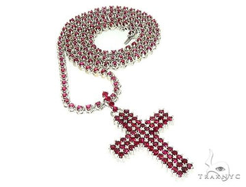 Mens ruby cross pendant set in 10k yellow and rose gold – front view showing ruby stones across cross face