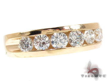 Yellow gold men's band with seven channel-set round diamonds
