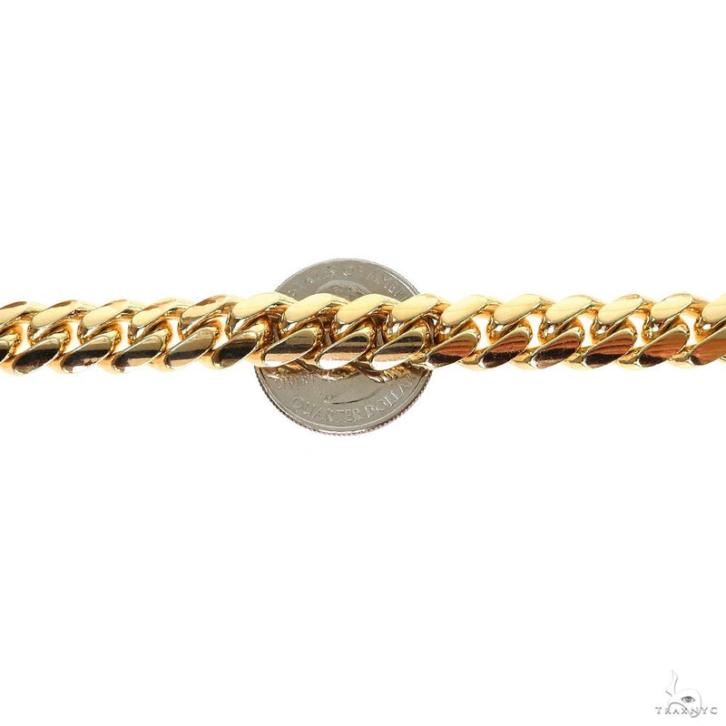 20-inch 10mm 10k yellow gold Miami Cuban chain with polished, thick links.