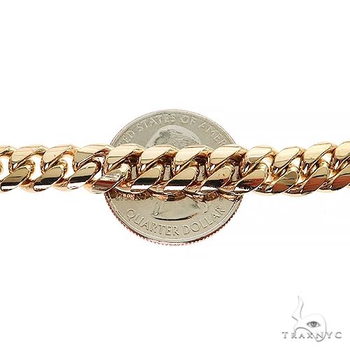 34-inch 8mm 14k yellow gold Miami Cuban chain with polished thick links.