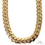 18-inch 14k yellow gold Miami Cuban chain with 15mm wide polished links.