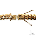 18-inch 14k yellow gold Miami Cuban chain with 15mm wide polished links.