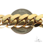14k yellow gold Miami Cuban chain, 15mm wide, polished finish, 34 inches long.