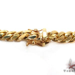 14k yellow gold Miami Cuban chain, 32 inches long, thick polished links, men's jewelry.